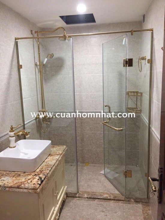 Phong tắm kính bản lề inox vàng Phong tắm kính bản lề inox vàng