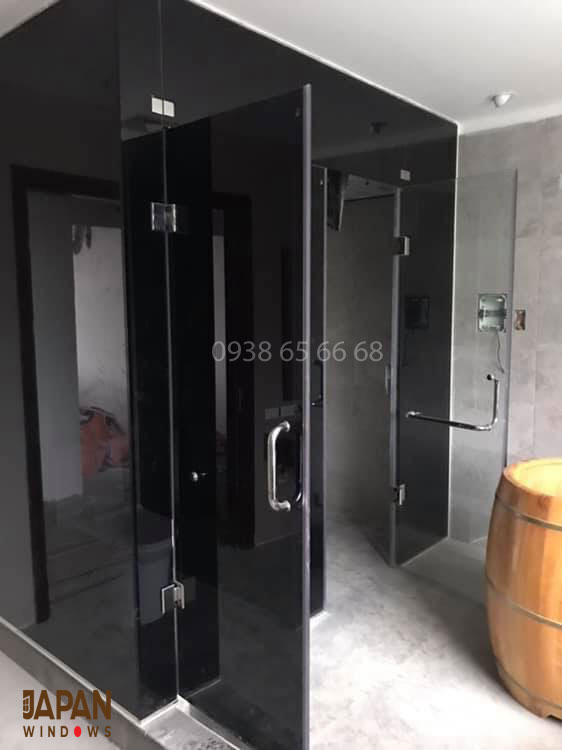 Vách ngăn phòng bằng kính 10ly xanh đen cường lực Vách ngăn phòng bằng kính 10ly xanh đen cường lực